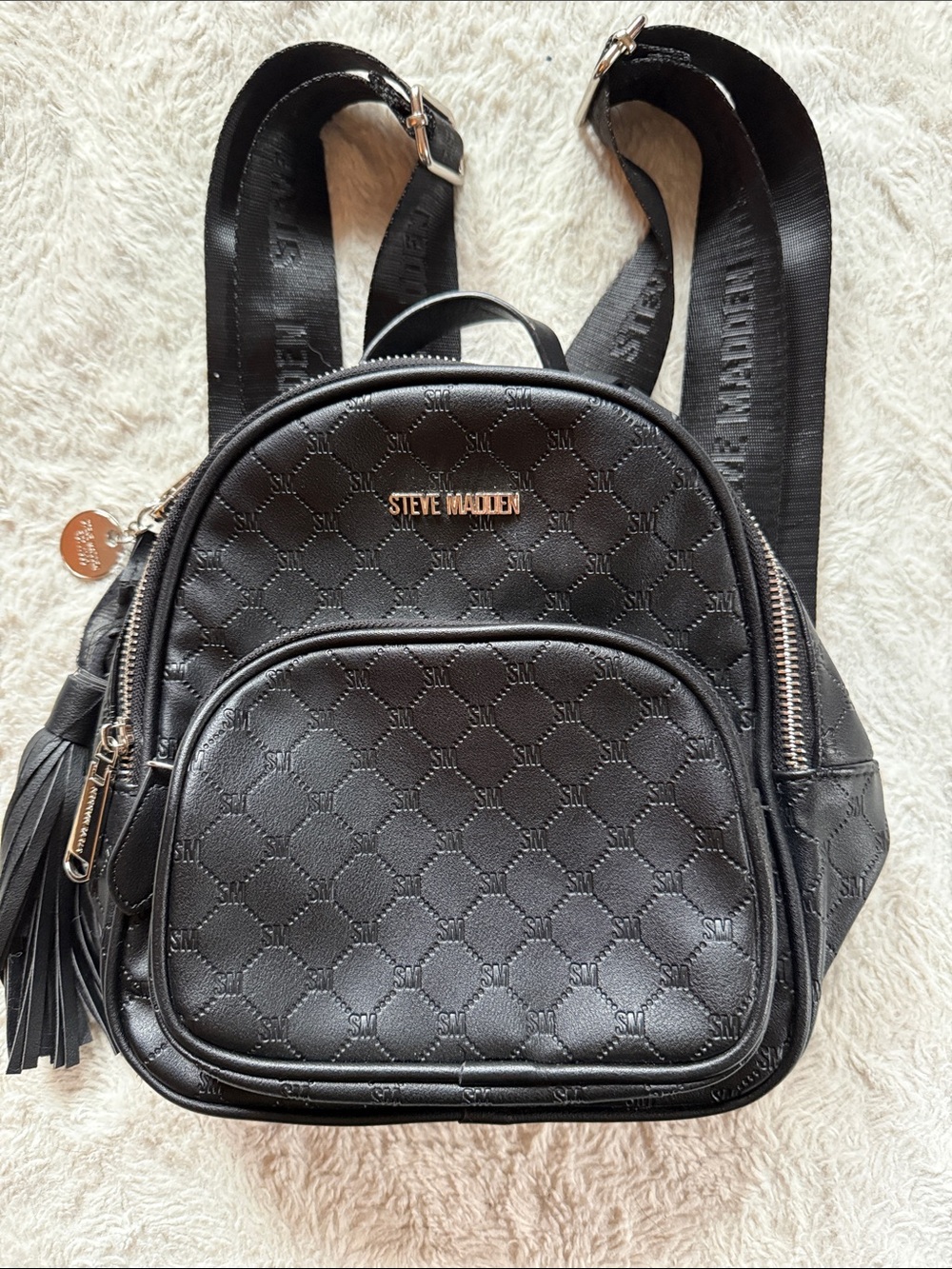 Steve Madden Black Quilted Mini Backpack with Tassel Zip Pocket